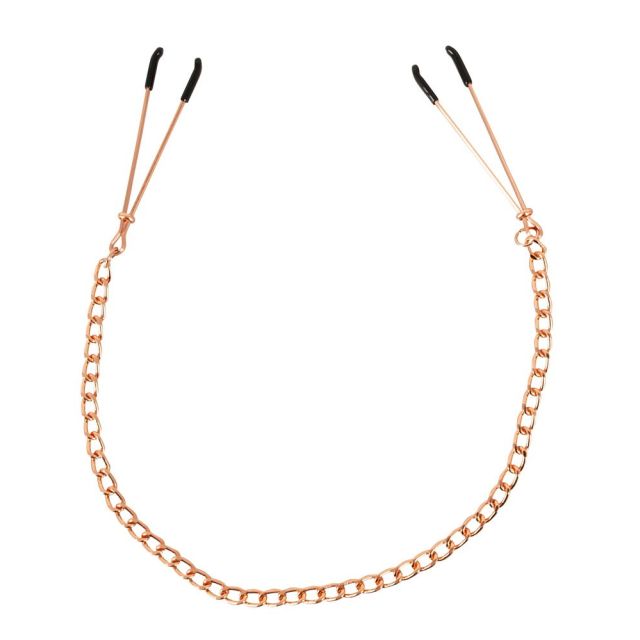Pinces à seins en acier rose-doré pour jeux BDSM. Elles permettent de pinces les tétons et de créer une sensation de douleur et de plaisir intense.