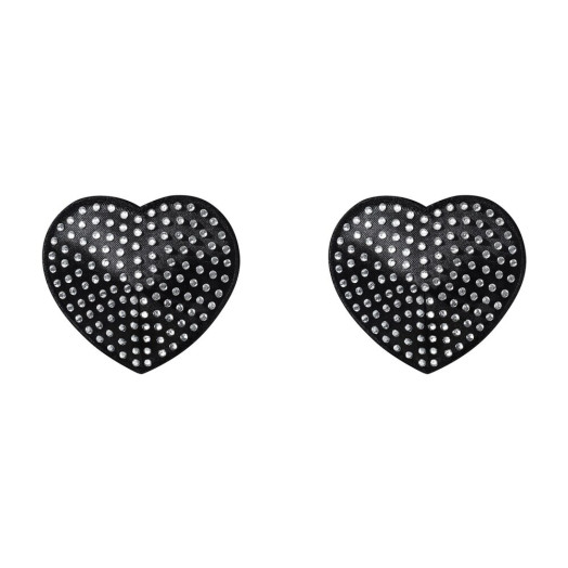 Nippies en forme de cœurs noirs qui habillent le bout des seins et subliment le décolleté